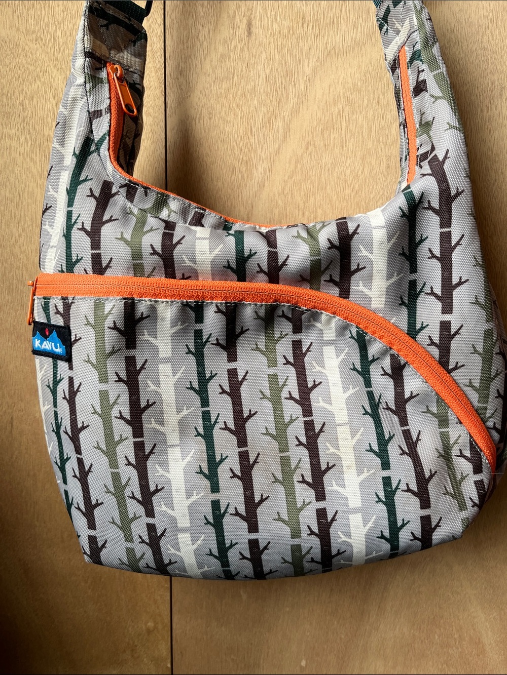 Kavu Tree Branch Crossbody Bag in Gray, Green, Brown with Orange Trim